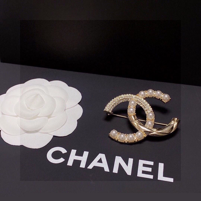 Ch*el brooches